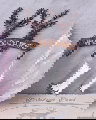 Cuier din metal cu agatatori cerb