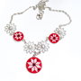 Colier cu elemente metalice si  broderie manuala pe panza rosie cod AR 3448