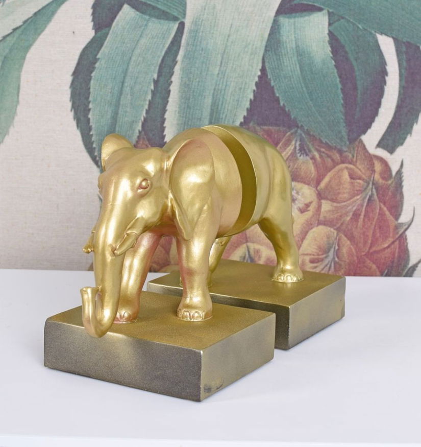 Set doua suporturi pentru carti cu un elefant auriu