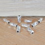 Distantier tub rasucit argintiu inchis 9x4x4mm SALAK 034