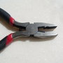 Cleste cu zimti pentru prins, taiat si presat aprox 11.3 cm