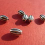 Margica bob de orez mare feliat si antichizat din argint .925 aprox 8x5 mm