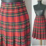 FUSTA PLISATA STOFA LANA TARTAN