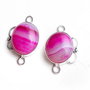 Pereche agate roz - in rama  de alama argintata
