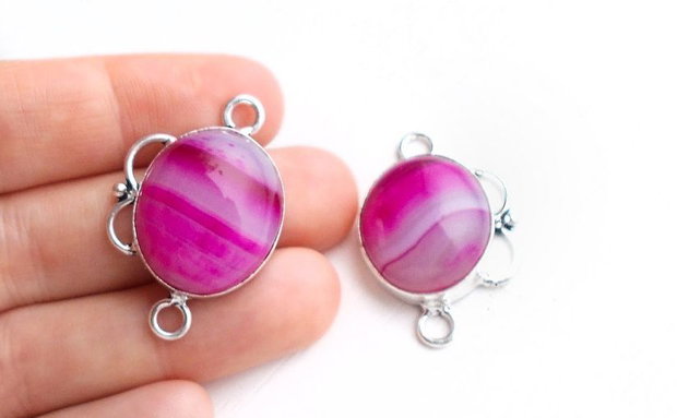 Pereche agate roz - in rama  de alama argintata
