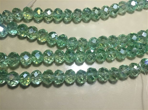 Șirag cristale (8x6mm) fatetate verzi, transparente