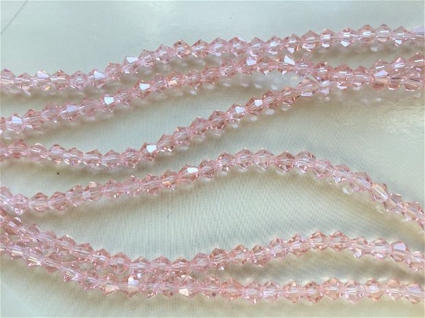 Șirag cristale biconice (4mm) roz, transparente