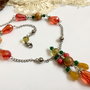 Colier cu pandantiv colorat in nuante de rosu