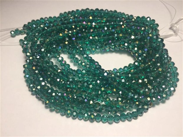 Șirag cristale (4x3,5mm) fatetate, nuanță verde smarald, transparente