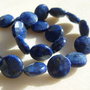 Lapis lazuli grad A banut fatetat pe ambele fete de diametru aprox 12 mm