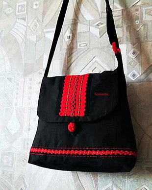 geanta neagra cu tesatura populara rosie