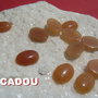 CADOU... Cabochon oval mic aventurin rosu aprox 15x10x4 mm