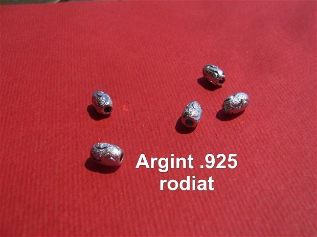 Margica stardust gravata din argint .925 rodiat aprox 6-6.5x4 mm