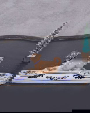 Bibelou din portelan cu un mops