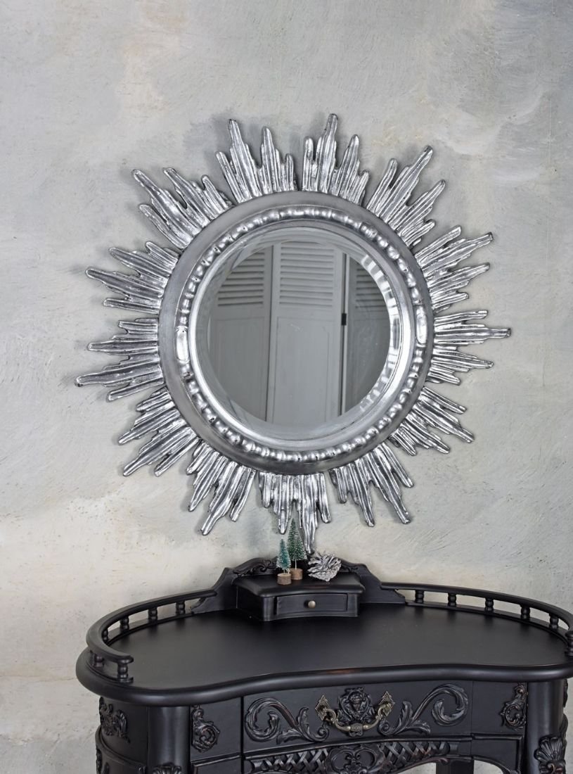 Oglinda din cristal cu un soare argintiu