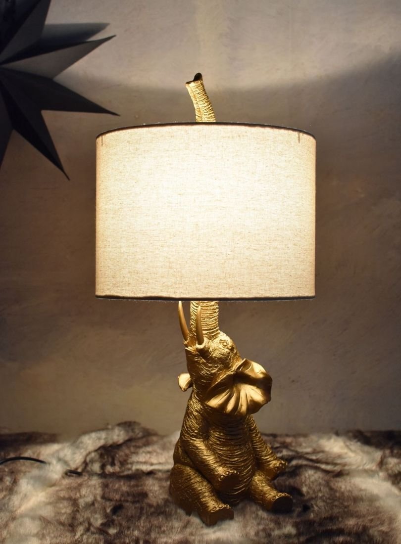 Lampa de masa cu un elefant auriu