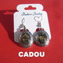 CADOU .... Cercei din metal finisaj satinat cu cabochon oval din scoica paua abalone