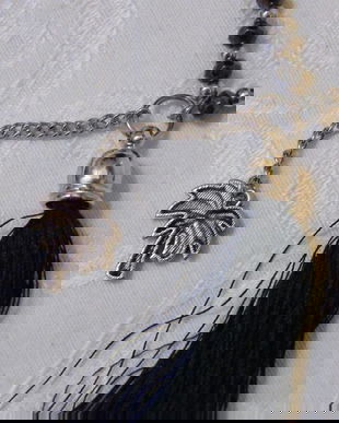 Lant cu ciucure si palmier