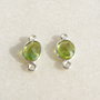 (2 bucati) Link oval din peridot fatetat in rama de argint .925 (India - lucrat manual) aprox 4x6x13 mm cu anourile