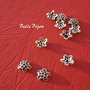 Capac dantelat din argint .925 antichizat aprox 7x2 mm
