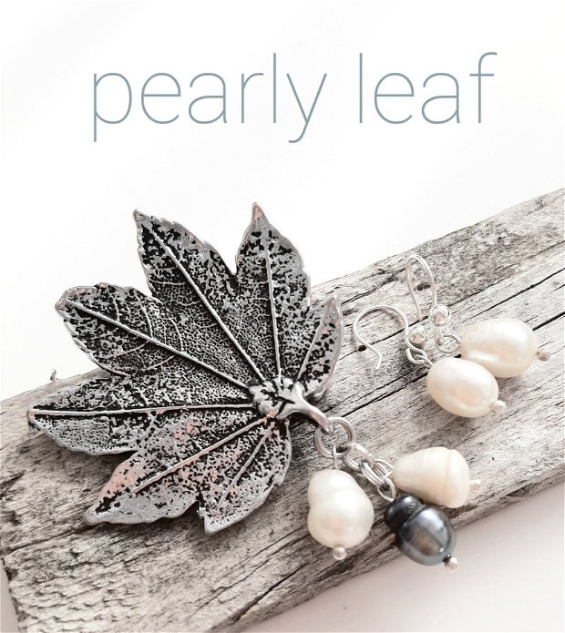 REZERVAT G.Broșă argintie frunză cu perle de cultură alb/negru