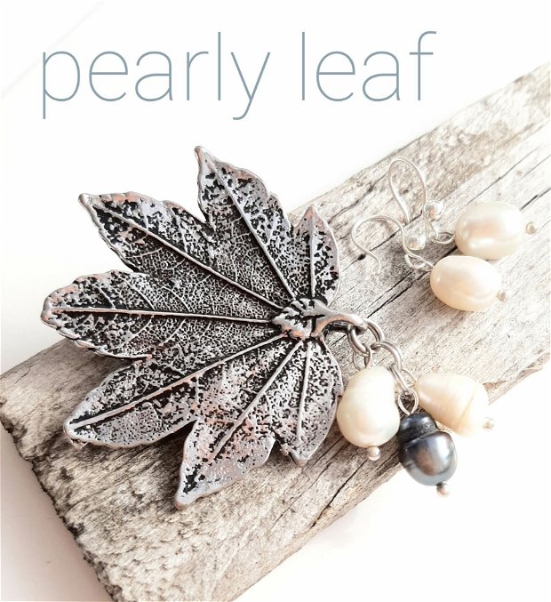 REZERVAT G.Broșă argintie frunză cu perle de cultură alb/negru