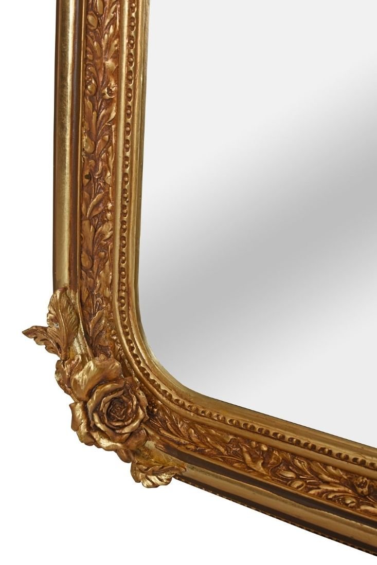 Oglinda din cristal cu o rama aurie cu diverse decoratiuni