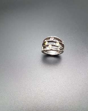inel de autor, din argint fin, cu model valuri, decorat cu safire galbene, rubin si cubic zirconia