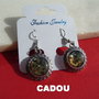 CADOU .... Cercei din metal finisaj satinat cu cabochon rotund din scoica paua abalone