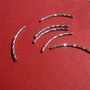 Tub arcuit si gravat (lung si subtire) din argint .925 rodiat aprox 30x1.5 mm