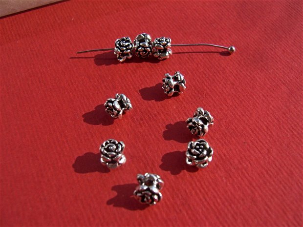 Distantier format din 2 trandafirasi argint .925 aprox 5.5x5 mm