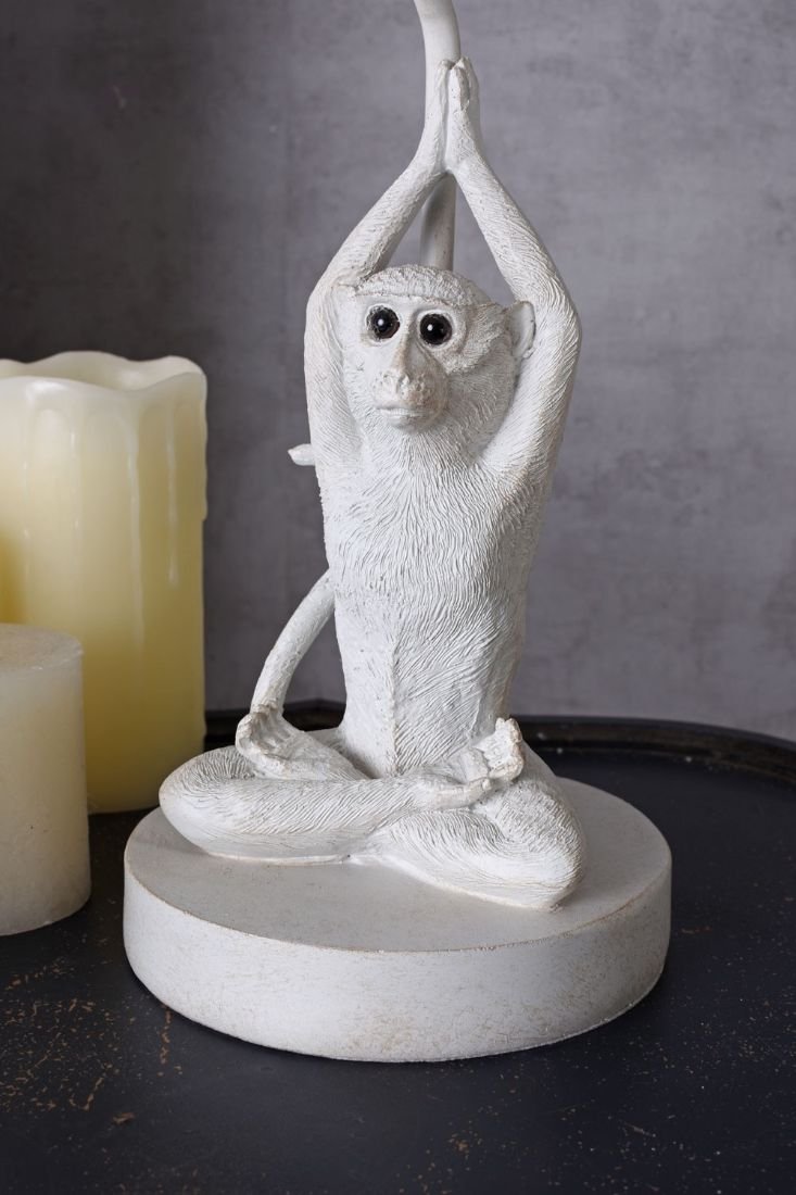 Lampa de masa cu o maimuta yoghina