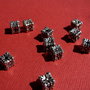 Cub model 1 din argint .925 partial antichizat aprox 6x6 mm