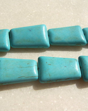 Turcoaz reconstituit trapez isoscel aprox 24.5x14-17x6 mm