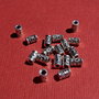 Tub din argint .925 partial antichizat aprox 5x3 mm