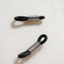 (2 bucati) Accesoriu negru din silicon pentru snur de ochelari