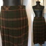 FUSTA PLISATA STOFA LANA KAKI TARTAN