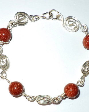 Bratara handmade din sarma si piatra goldenstone