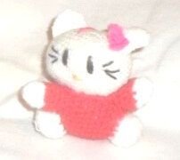 Hello Kitty cu rochita rosu deschis 10 cm
