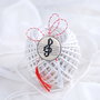 Brosa , martisor cu broderie manuala - cheia sol pe portativ