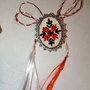 Brosa , martisor  brodat manual