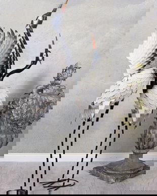 Doua pasari din metal alb cu negru