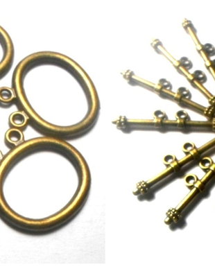 Inchizatoare toggle oval cu 2 orificii bronz