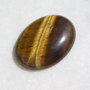 Cabochon ochi de tigru aprox 40x30x7.7 mm