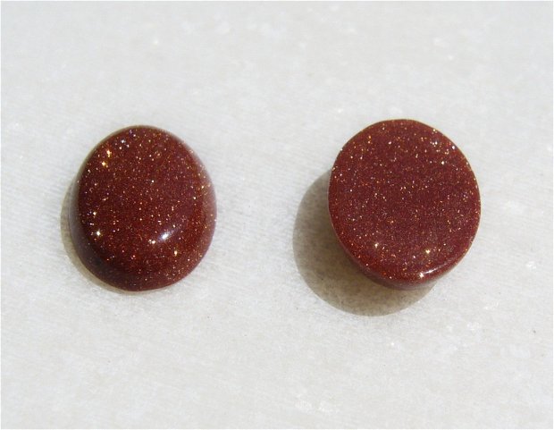 (2 bucati) Cabochon oval din brown goldstone aprox 14x10x4 mm