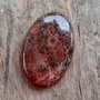 Cabochon poppy jasper, 41x27 mm