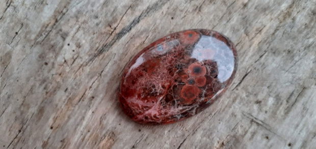 Cabochon poppy jasper, 41x27 mm