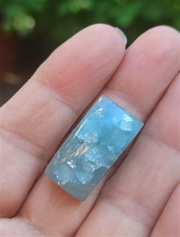 Inel rasina cu pigment albastru si insertii metalizate argintii