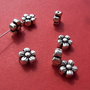 Floare din argint .925 partial antichizat aprox 9x9x5 mm