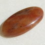 Cabochon aventurin portocaliu oval alungit aprox 39x18.5x6 mm